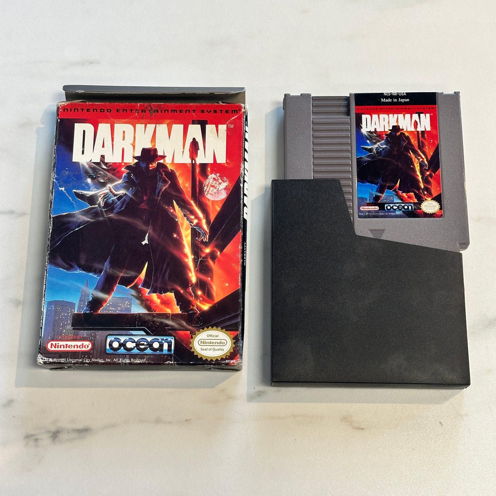 Darkman game cartridge and packaging on a light background